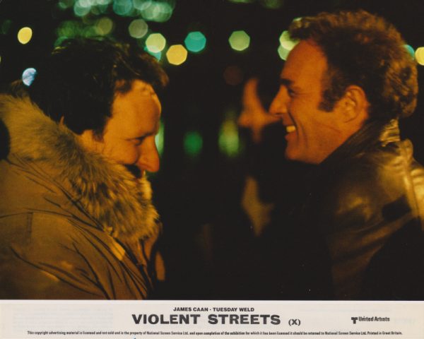 Director Michael Mann sharing a light-hearted moment with lead James Caan