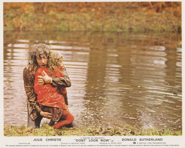 Donald Sutherland attempts to rescue the girl from a lake