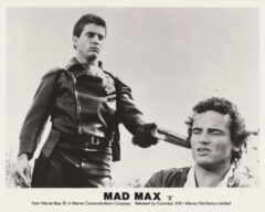 Mel Gibson as Max alongside Tim Burns as "Johnny the Boy" in Mad Max (1979)