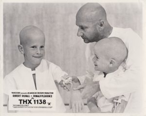 Donald Pleasence with two child actors in THX 1138.