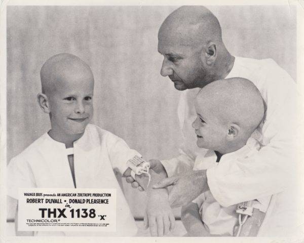Donald Pleasence with two child actors in THX 1138.