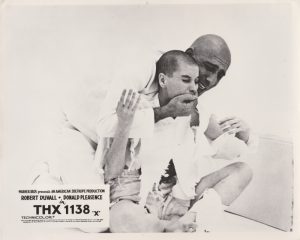 Donald Pleasence with two child actors in THX 1138.