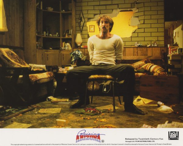 Nicolas Cage starring in Raising Arizona (1987)