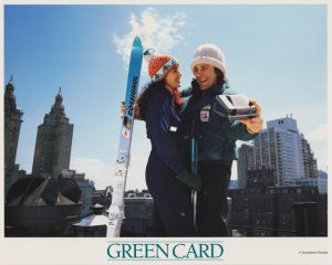 Gérard Depardieu taking a Polaroid with Andie MacDowell