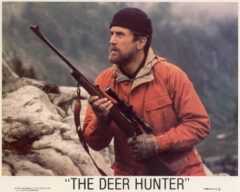 A vintage colour cinema lobby card featuring Robert De Niro in The Deer Hunter (1978)