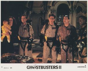 Card #08: All four Ghostbusters, along with Dana and Oscar (baby)