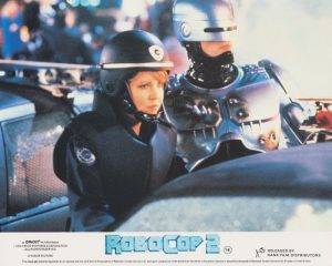 Nancy Allen alongside Peter Weller (as RoboCop)