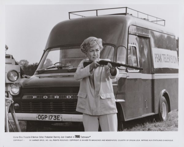 Joan Crawford takes aim