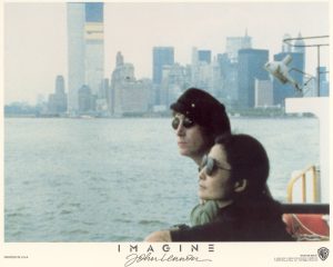 John Lennon with Yoko Ono on a ferry off Manhattan Island, New York, New York
