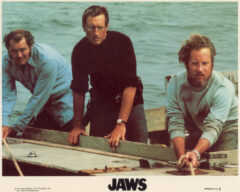 A vintage lobby card from the 1978 rerelease of Jaws in cinemas