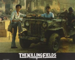 A vintage Front of House Lobby Card featuring a scene from Bruce Robinson's The Killing Fields (1984)