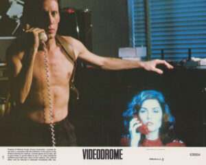 James Woods with Deborah Harry in Videodrome (1983)