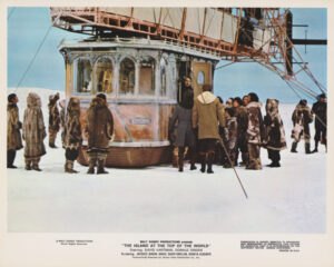 A vintage lobby card for The Island at the Top of the World (1974)