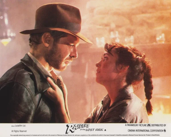 Indiana Jones (Harrison Ford) with Marion Ravenwood (Karen Allen)