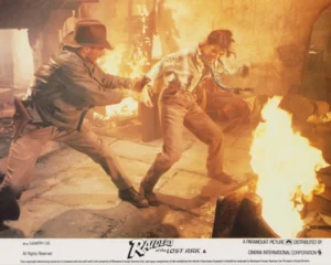 Indy rescues Marion from her flaming bar