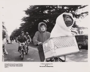 An iconic scene from Spielberg's E.T. (1982)