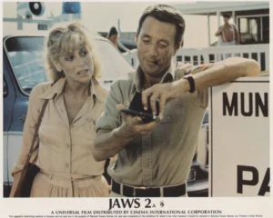 A vintage Jaws 2 British lobby card featuring Lorraine Gary and Roy Scheider