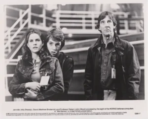 Ally Sheedy, Matthew Broderick and John Wood in a scene from WarGames (1983) [vintage press photograph]