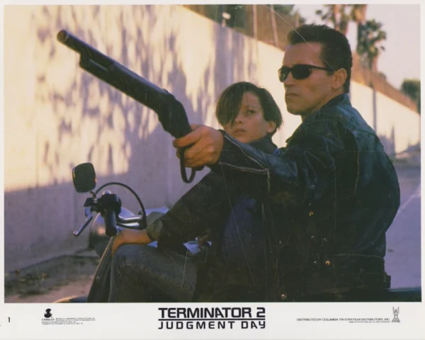 Edward Furlong and Arnold Schwarzenegger in Terminator 2: Judgment Day (1991)