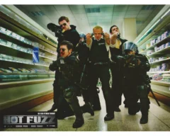 Paddy Considine (bottom-left), Simon Pegg (centre), Nick Frost (second-right) and others in Hot Fuzz (2007)