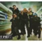 Paddy Considine (bottom-left), Simon Pegg (centre), Nick Frost (second-right) and others in Hot Fuzz (2007)