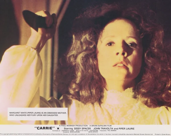 Piper Laurie stars as Carrie's obsessed mother Margaret White