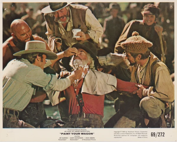Lee Marvin receives a wet shave