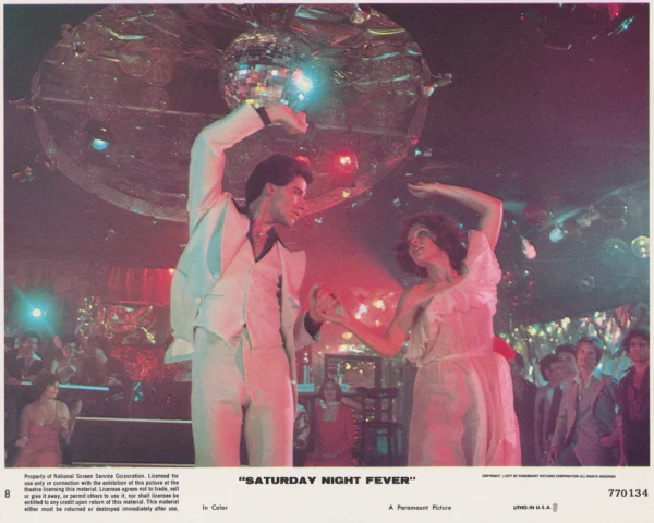 An iconic dancing scene from Saturday Night Fever (1977)