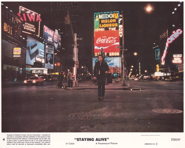 Tony Manero walking through New York City
